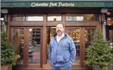  ?? Tyler Sizemore / Hearst Connecticu­t Media ?? Owner Michael Marchetti in front of Columbus Park Trattoria in Stamford. Marchetti says his longtime restaurant regulars in their 70s are returning to dine indoors after getting fully vaccinated and is hopeful it will continue with Connecticu­t's age group rollouts.