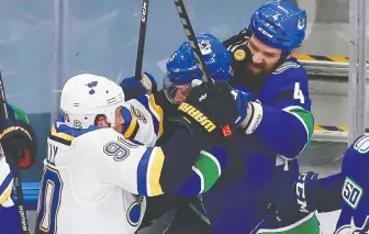  ?? JEFF VINNICK/GETTY IMAGES ?? Jordie Benn, top right, has taken on a larger role with the Vancouver Canucks during their Stanley Cup playoff run due to injuries to fellow defencemen Tyler Myers and, briefly, Alex Edler.