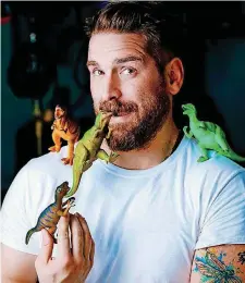  ?? [PHOTO BY CHAD BAKER] ?? Adam Hampton, pictured, stars in the Oklahomama­de sci-fi film “The Jurassic Games.”