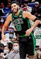  ?? Derick Hingle / Associated Press ?? Celtics forward Jayson Tatum reacts after a scoring play against the Pelicans on Saturday. Tatum scored 38 points in the 107-97 win.