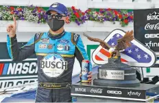  ?? MATT SLOCUM/ASSOCIATED PRESS ?? Kevin Harvick celebrates winning Saturday at Pocono Raceway.