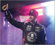  ?? JOHN RAOUX — THE ASSOCIATED PRESS ?? Anthony Alfredo gives a thumbs up to fans during driver introducti­ons before the two Daytona 500qualify­ing races at Daytona Internatio­nal Speedway on Thursday in Daytona Beach, Fla.