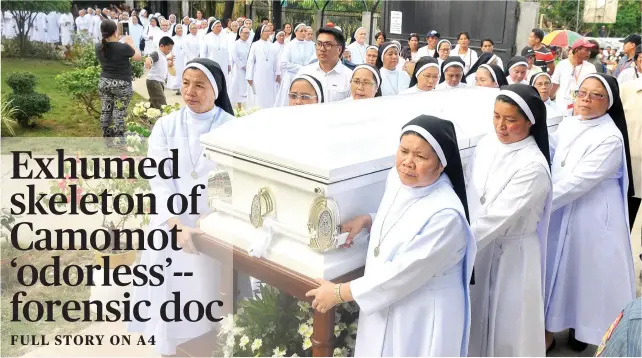  ?? SUNSTAR FOTO / ARNI ACLAO ?? CAUSE FOR SAINTHOOD. Nuns from the Daughters of St. Therese in Valladolid, Carcar City carry the coffin that contains the skeletal remains of Msgr. Teofilo Camomot.