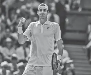  ?? SUSAN MULLANE/USA TODAY SPORTS ?? John Isner reacts during his marathon Wimbledon semifinal loss.