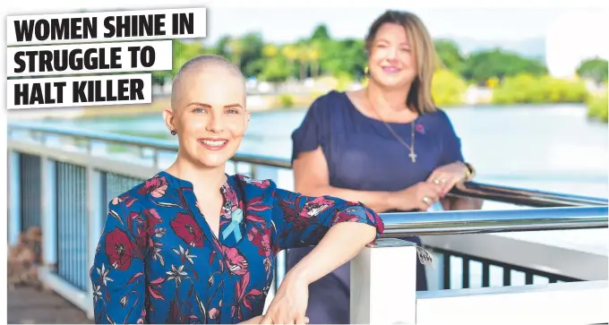  ?? Picture: SHAE BEPLATE ?? CANCER LIGHT: Dr Alisha Thomson, who has ovarian cancer, with ovarian cancer survivor Leeann Webster, in front of the Queensland Country Bank Stadium which will be lit in teal tonight to mark World Ovarian Cancer Day.