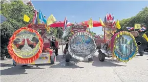  ?? ?? The Klong Luang (Lanna-style big drum) contest returned to the ancient town of Lamphun to commemorat­e Visakha Bucha Day.