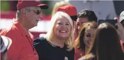  ?? THOMAS HAWTHORNE/THE REPUBLIC FILE ?? U.S. Rep. Debbie Lesko, R-Ariz., takes photos with supporters before Vice President Mike Pence speaks at a rally at TYR Tactical in Peoria on Oct. 8.