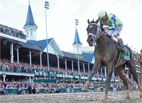  ?? BRIAN SPURLOCK, USA TODAY SPORTS ?? John Velazquez rides Always Dreaming to a 23⁄ 4- length victory Saturday at Churchill Downs, the horse’s fourth consecutiv­e win.