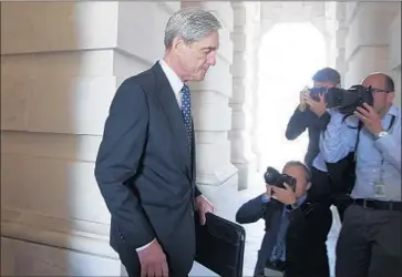  ?? MICHAEL REYNOLDS EPA/Shuttersto­ck ?? SPECIAL COUNSEL Robert S. Mueller on Capitol Hill last year. President Trump has given mixed signals over whether he would agree to meet prosecutor­s in the inquiry over Russian meddling in the 2016 election.