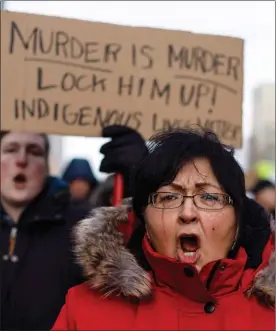  ?? The Canadian Press ?? A marcher cries during a rally in Edmonton on Saturday in response to Gerald Stanley's acquittal in the shooting death of Colten Boushie.