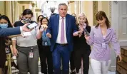  ?? SCOTT APPLEWHITE / ASSOCIATED PRESS ?? House Minority Leader Kevin McCarthy, R-Calif., heads to his office hounded by reporters after being issued a subpoena Friday.