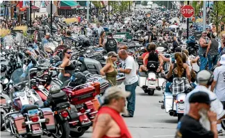  ?? GETTY IMAGES ?? A motorcycle rally in South Dakota in August attracted a crowd of about 250,000, highlighti­ng the disparate public health responses among American states. At the same time, New York was slowly emerging from a strict lockdown.