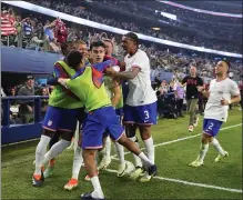  ?? JULIO CORTEZ — THE ASSOCIATED PRESS ?? Gio Reyna, center, celebrates his goal with teammates after giving the U.S. a 2-0 lead over Mexico in the CONCACAF Nations League final.