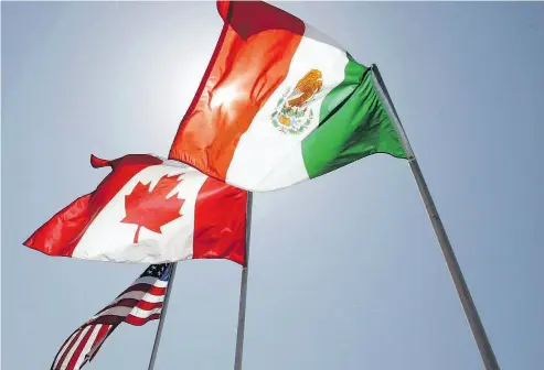  ?? JUDI BOTTONI / THE CANADIAN PRESS FILES ?? The Trump administra­tion fears delay could allow political factors to derail a trade deal with Canada and Mexico.
