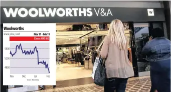  ?? Bloomberg ?? CUSTOMERS enter the Woolworths V&amp;A Waterfront store, operated by Woolworths Holdings. Two more resignatio­ns with immediate effect have hit the food and clothing retailer. | HALDEN KROG