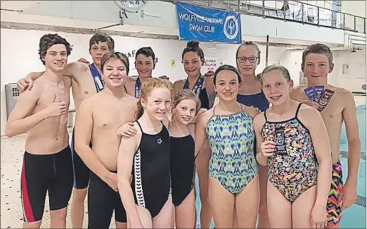  ??  ?? Front row, from left, Wolfville Triton swimmers Daniel Jurt, Maggie Graves, Eliza Stokesbury Price, Hannah Williams and Eliese Groeneveld. Second row, Sean Vibert, Nicolaas Groeneveld, Bo Stokesbury Price, Ava Vial, Chelsea Beaulieu and Gabe Graves.