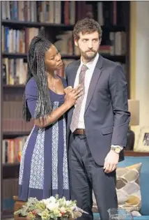  ?? James Marcus ?? ROSLYN RUFF and Joby Earle onstage in New York in Danai Gurira’s “Familiar,” drawn from her own family experience.