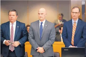  ?? ROSE BACA/THE DALLAS MORNING NEWS ?? Fired Balch Springs police officer Roy Oliver, center, was convicted of murder Tuesday for fatally shooting an unarmed black teenager.