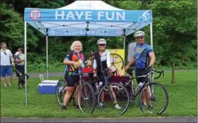  ??  ?? Montgomery County officials kicked off the 2016Trail Challenge by handing out informatio­n to trail users June 4on the Schuylkill River Trail.