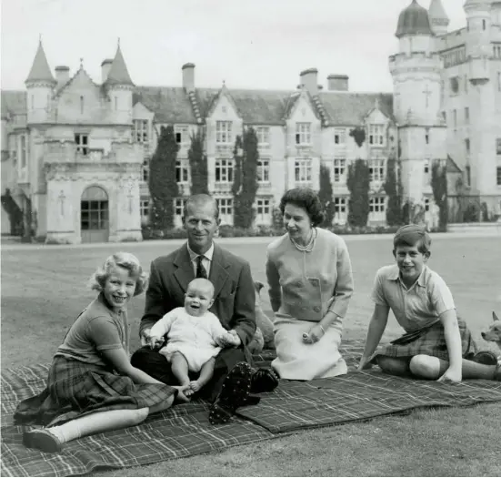  ??  ?? The family, including the baby Prince Andrew, at Balmoral Castle, Scotland, 9 September 1960
Previous page: waving to crowds in Nassau, Bahamas, February 1966