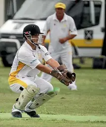  ??  ?? Left: Neil Bell, a stalwart of Hinuera cricket, stepped up from the Bs to help the As on Saturday. Right: Young Kieran Holdsworth also stepped up to play for the As, at wicket keeper in this game against St Paul’s Collegiate.