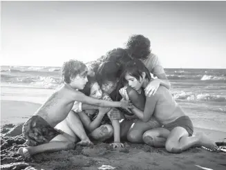  ?? Tribune News ?? (L to R) Marco Graf as Pepe, Daniela Demesa as Sofi, Yalitza Aparicio as Cleo, Marina De Tavira as Sofia, Diego Cortina Autrey as Tono, Carlos Peralta Jacobson as Paco in Roma, written and directed by Alfonso Cuaron.