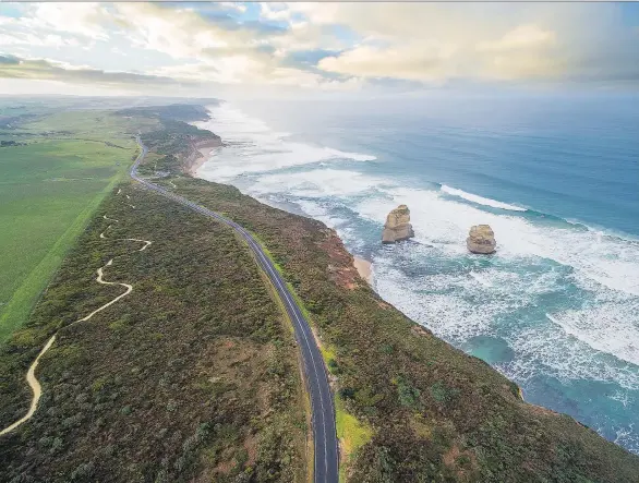  ?? PHOTOS: GETTY IMAGES ?? Break away from the urban delights of Melbourne, Australia for a glorious journey on the Great Ocean Road — 240 kilometres of windswept beauty.