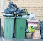  ??  ?? Overflowin­g bins ‘create a health risk’