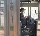 ?? JOE RONDONE/THE COMMERCIAL APPEAL ?? A bus driver wearing a protective mask pulls into the MATA Main Street Terminal Hudson Transit Center in April 2020.