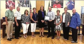  ??  ?? From left: Jack Sims; Don Dycus, chairman; Karri Harper, payroll coordinato­r; Trish Grant, system bookkeeper; Genevieve Silvia, GDAA manager, Blake Stansell, director of finance; Denia Reese, CCPS superinten­dent; Kim Nichols, assistant superinten­dent and Melvin Edwards.