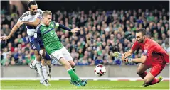  ??  ?? Close call: Steven Davis fires in a shot at the San Marino goalkeeper Aldo Simoncini