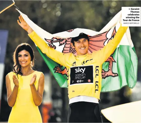  ?? MARCO BERTORELLO ?? > Geraint Thomas celebrates winning the Tour de France