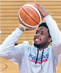  ?? PHOTO: GREGOR RICHARDSON ?? Back on court . . . Otago Nuggets import Isaiah Moss (24) shoots at the Edgar Centre on Thursday after arriving in Dunedin.