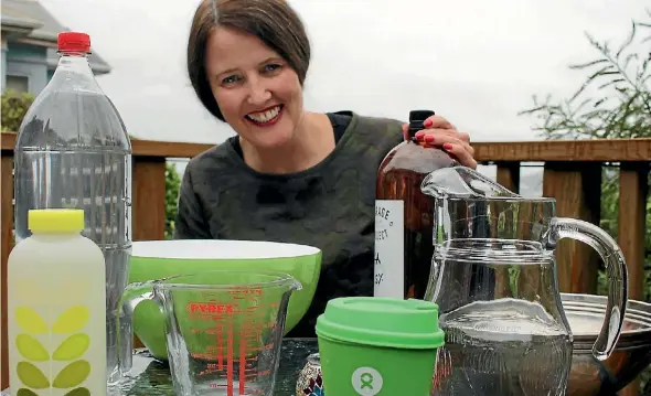  ?? PHOTO: LUCY SWINNEN ?? ‘‘As a proud Wellington­ian I’ll be using my craft beer empties ... to store my water for the day.’’ Paula Feehan on the Taps Off challenge.