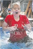  ?? DAN JANISSE ?? Liza Browne makes a splash at the 2019 Polar Plunge. This year’s event takes place Feb. 28.