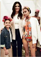  ??  ?? Rachel Roy with her daughters backstage after a show CHILDHOOD DREAMS