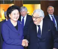  ?? WANG YING / XINHUA ?? Vice-Premier Liu Yandong shakes hands with former US secretary of state Henry Kissinger before a forum where they both spoke at Columbia University in New York on Tuesday.