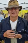  ??  ?? Peter Huszcz, who has been tending the purple martin “condo complex” at the Nepean Sailing Club for the past 15 years, also monitors a smaller 32cavity nesting box in his own backyard