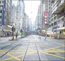  ?? MOHD RASFAN AFP via Getty Images ?? THIS road in Causeway Bay shopping district is usually packed.