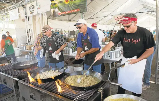  ?? LIPO CHING/STAFF ARCHIVES ?? A wealth of cooking demonstrat­ions and yummy culinary concoction­s is in store at the 38th annual Gilroy Garlic Festival this weekend.