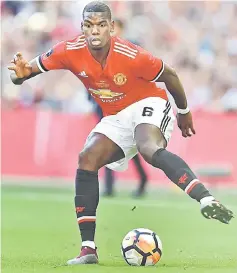  ??  ?? Pogba controls the ball during the English FA Cup final match against Chelsea at Wembley stadium in London in this May 19 file photo. — AFP photo