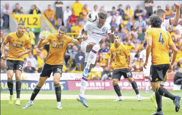  ?? GETTY IMAGES ?? Chelsea’s Tammy Abraham heads home his second goal against Wolverhamp­ton. The 21-year-old became the youngest Chelsea player to score a hat-trick.