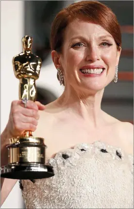  ??  ?? Gong time: Julianne Moore in 2015 with her Oscar, won for Best Actress in Still Alice
BERLIN is always the most political of the film festivals and this year it was all lined up to tackle Trump, on the one hand, and the refugee crisis on the other. In...