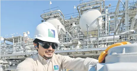  ?? — AFP photo ?? Aramco has pledged to achieve ‘operationa­l net-zero’ carbon emissions by 2050, which does not include the emissions from customers burning its products.