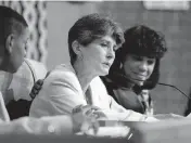  ?? CHUCK FADELY Miami Herald file ?? In this file photo from Feb. 21, 1996, Miami-Dade School board chairman Janet McAliley announces that she would not run for re-election after serving four terms in 16 years since 1980.