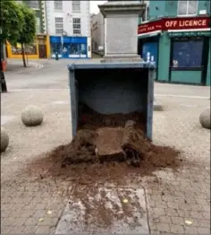  ??  ?? The vandalised planter in the Bullring in Wexford last week.