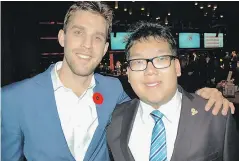  ??  ?? Canucks forward and Sports Celebritie­s Festival ambassador Brandon Sutter and Special Olympics athlete and spokespers­on Alexander Pang greeted some 650 guests to the annual dinner and auction at the Vancouver Convention Centre.