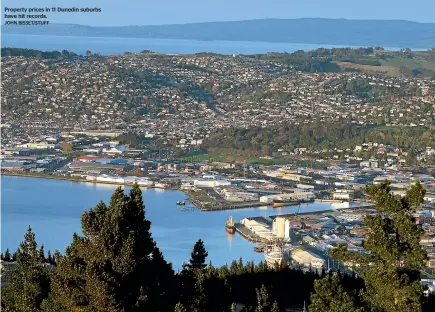  ?? JOHN BISSET/STUFF ?? Property prices in 11 Dunedin suburbs have hit records.