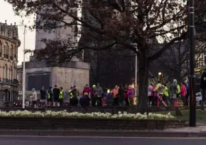  ??  ?? UP WITH
THE LARK
(main image) Early Bird Run Crew founder Ben Davis; (this page) meeting at the cenotaph in Harrogate