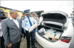  ?? Pictures: SINO MAJANGAZA ?? ON A MISSION: Police Minister Fikile Mbalula and national police commission­er Lieutenant-General Khehla Sitole at a farm where drugs were discovered yesterday